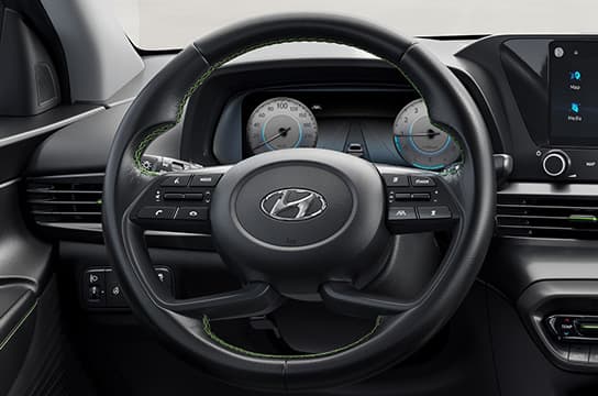 Sporty 4-spoke steering wheel.