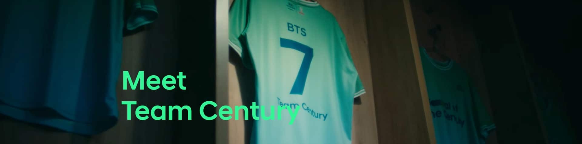 The Team Century jersey belonging to BTS with the number 7 on it hanging up in the changing room. “Meet Team Century” is written in green across the image.